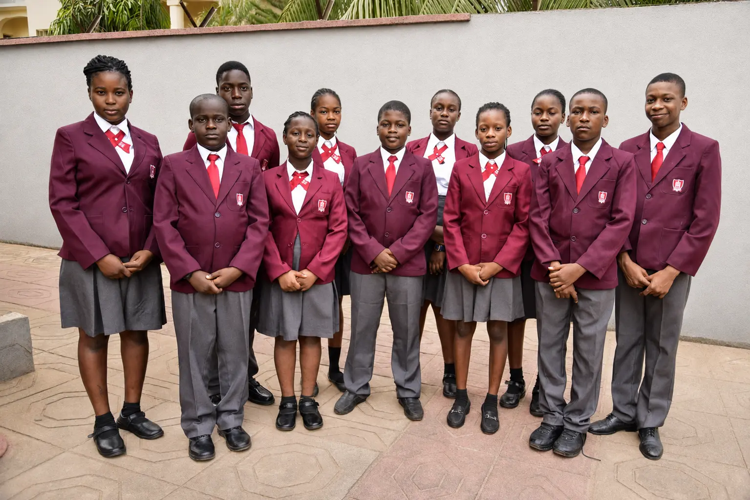 Petra Academy students in their burgundy school uniforms